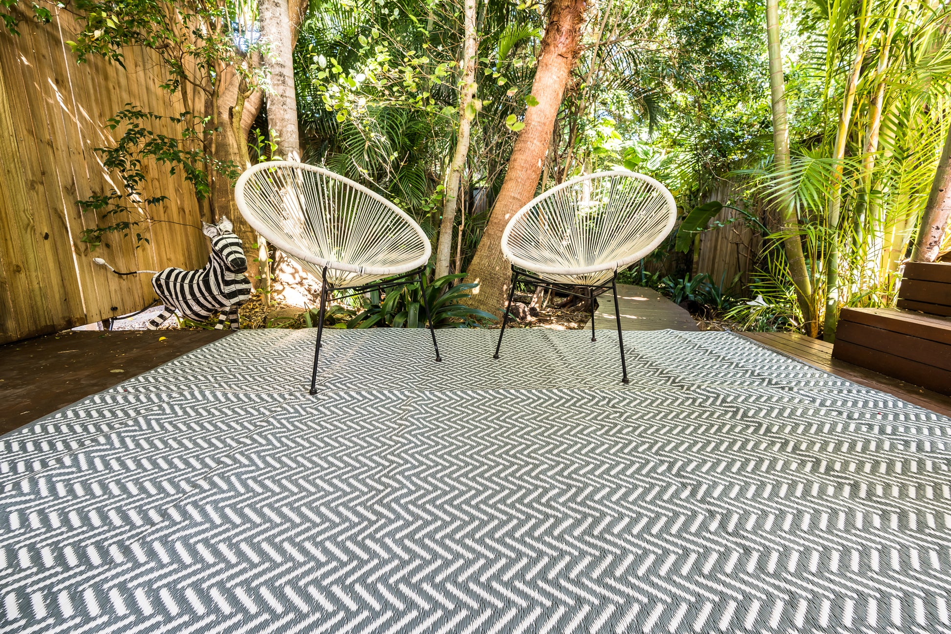 Herringbone cool grey outdoor rug used for camping caravan patio outdoor setup