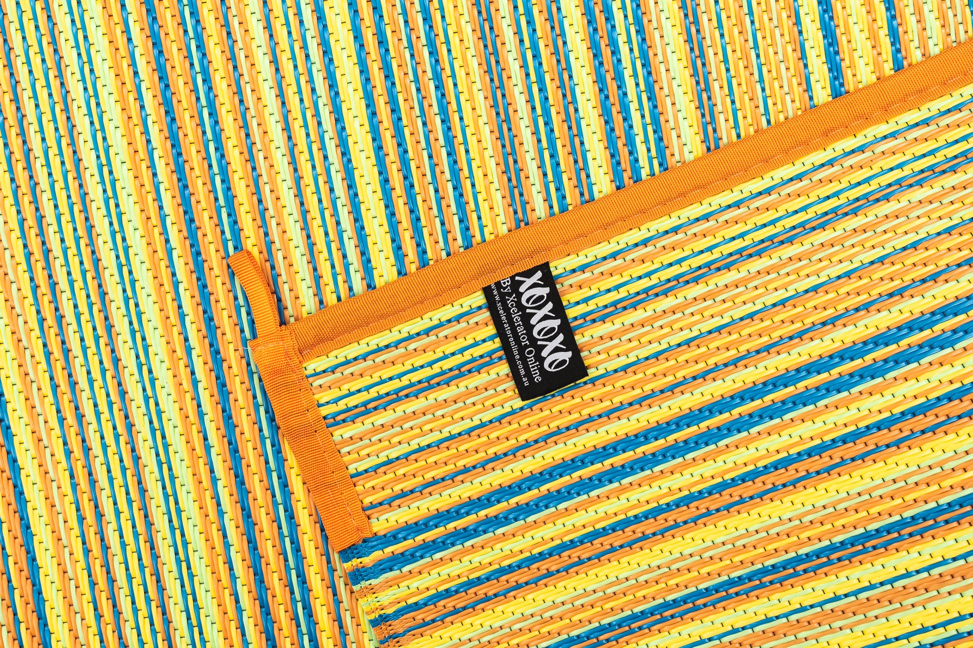 mexicali yellow outdoor rug woven polypropylene texture close up
