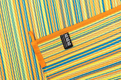 mexicali yellow outdoor rug woven polypropylene texture close up