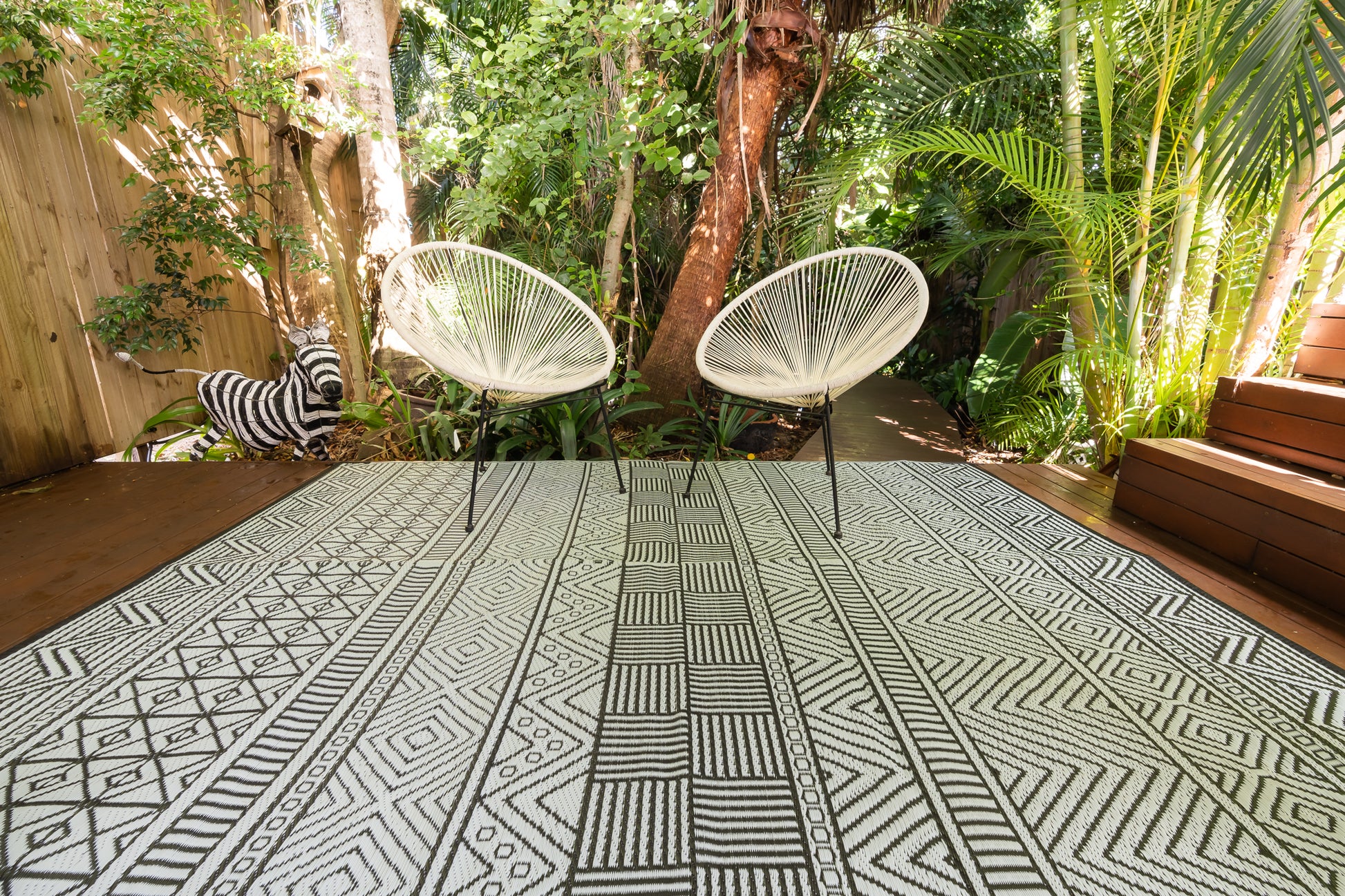 Swazi black outdoor rug used for camping caravan patio outdoor setup