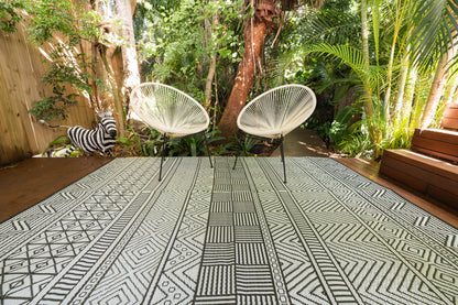 Swazi black outdoor rug used for camping caravan patio outdoor setup